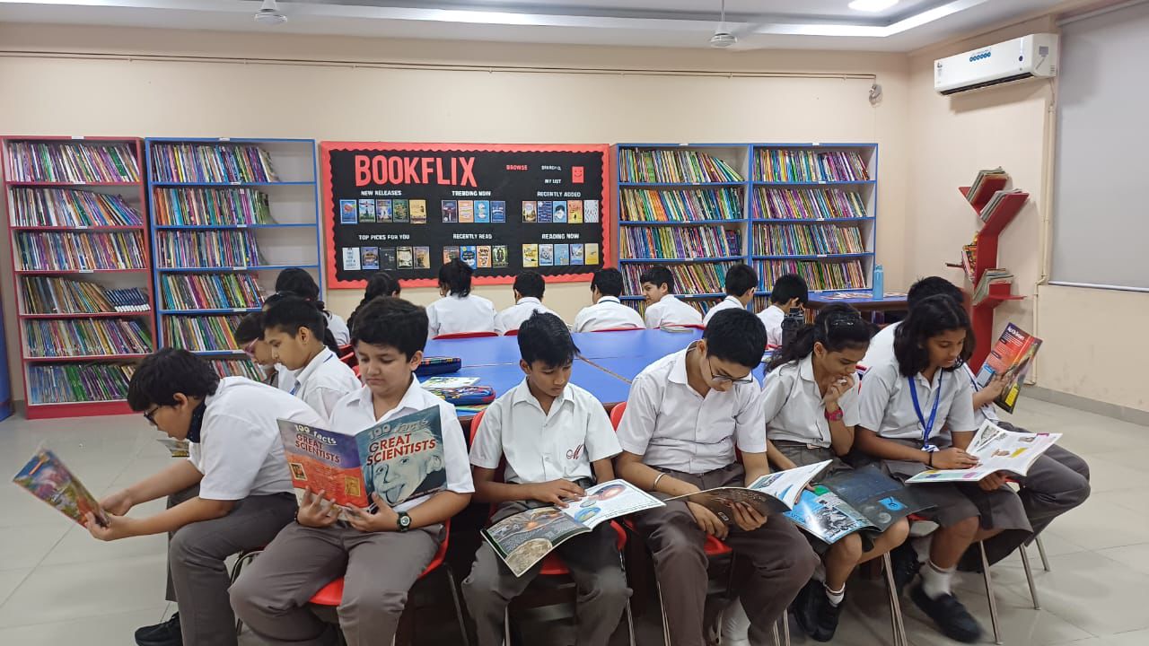 Turning Pages with Play: Musical Chairs in the Library!